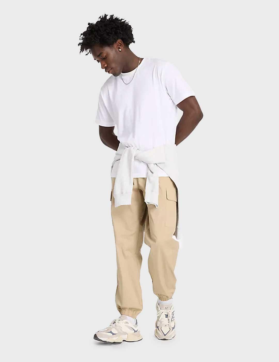 Pantalones New Balance Twill Cargo Jogger beige para hombre