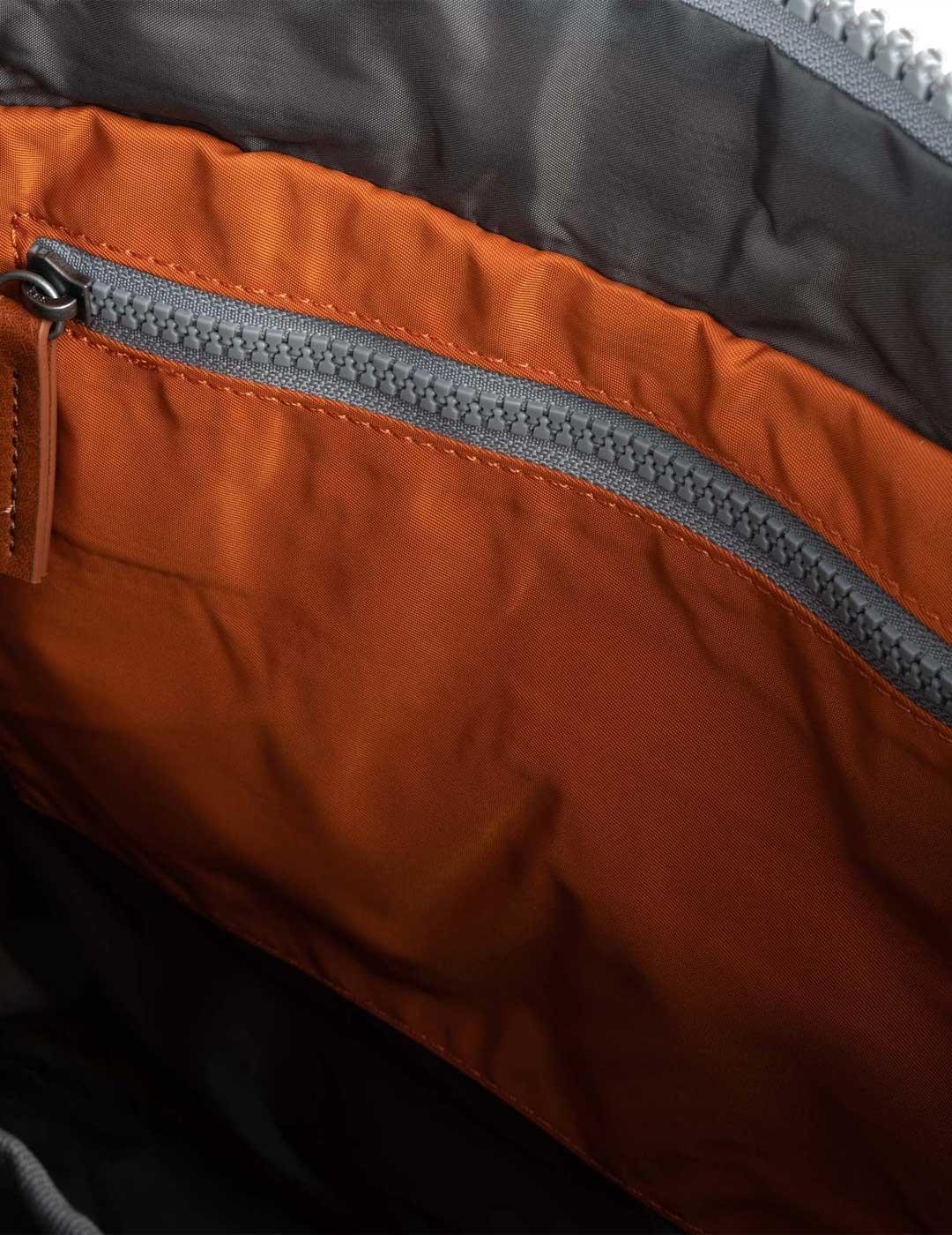 Roka Canfield mochila naranja pequeña para hombre y mujer