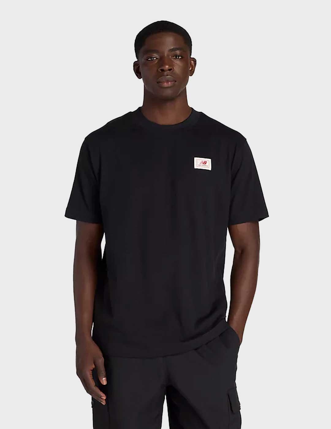 New Balance Woven Label camiseta negra para hombre y mujer